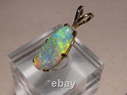 3.1 ct. Opal Pendant 14 kt yellow gold Lightning ridge crystal opal